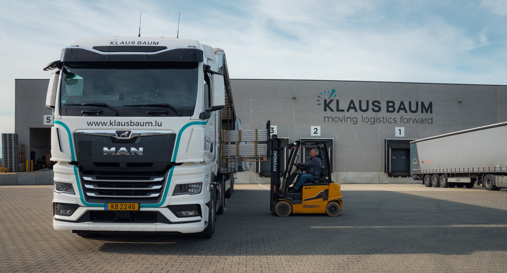 Worker loading a truck